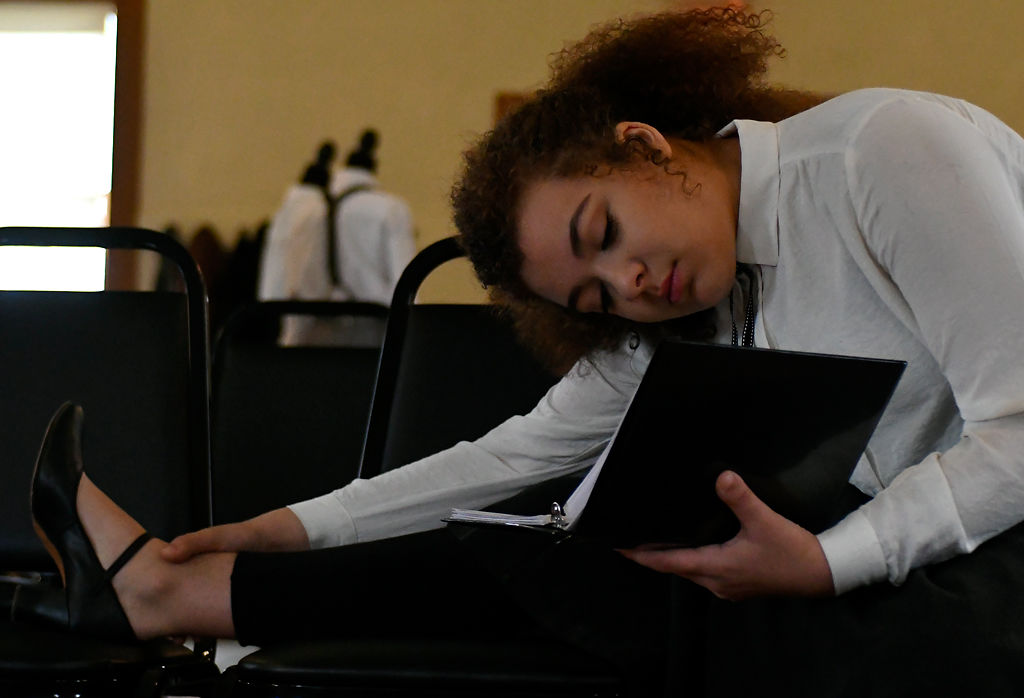 Adora Snead stretches before going onstage as Milly Sawyers